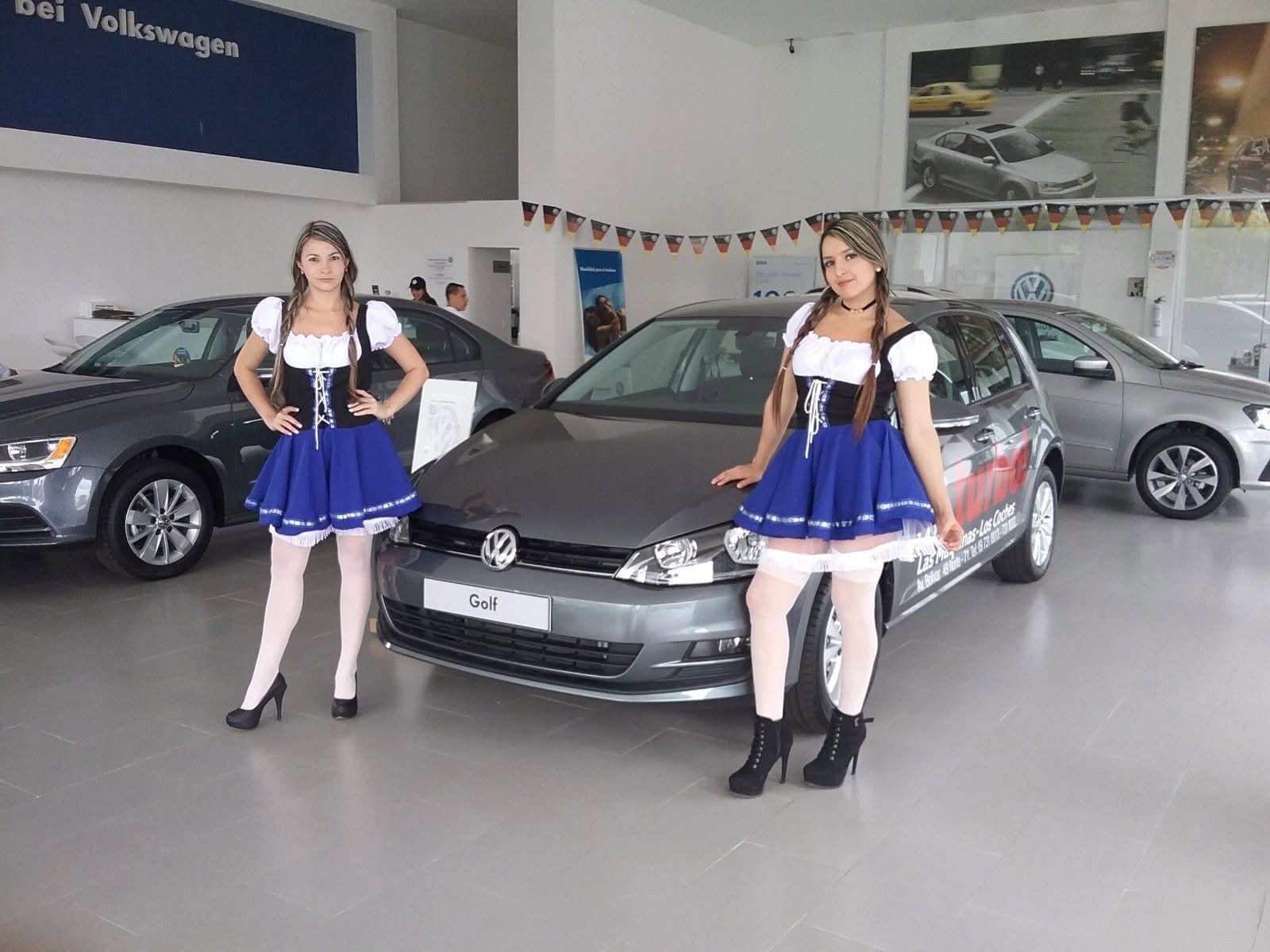 Motor vehicle, Car, Car dealership, Auto show, Volkswagen, Exhibition, Person — Campañas Pereira Manizales Armenia | Focus Modelos ABTL Agencia BTL Eje Cafetero