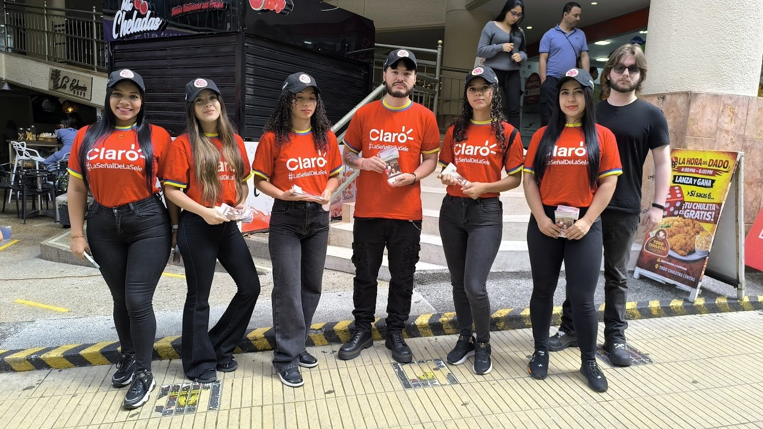 Smile, Youth, Hat, Orange, Cap, Logo, Person, Top — Campañas Pereira Manizales Armenia | Focus Modelos ABTL Agencia BTL Eje Cafetero